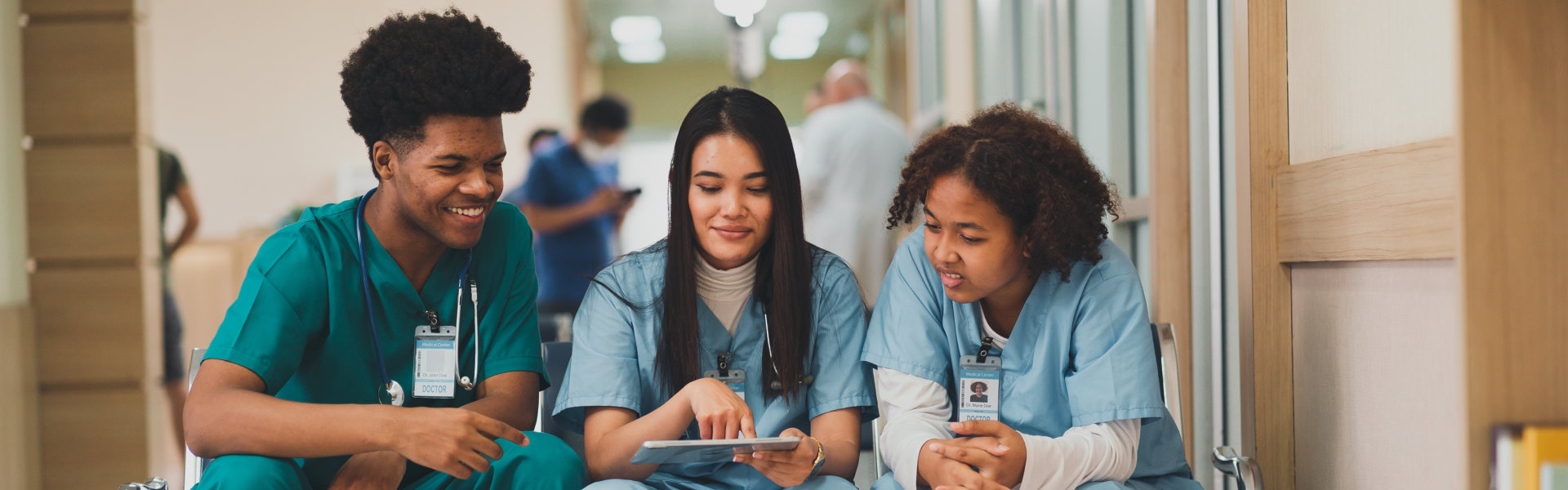 nurses reading a chart