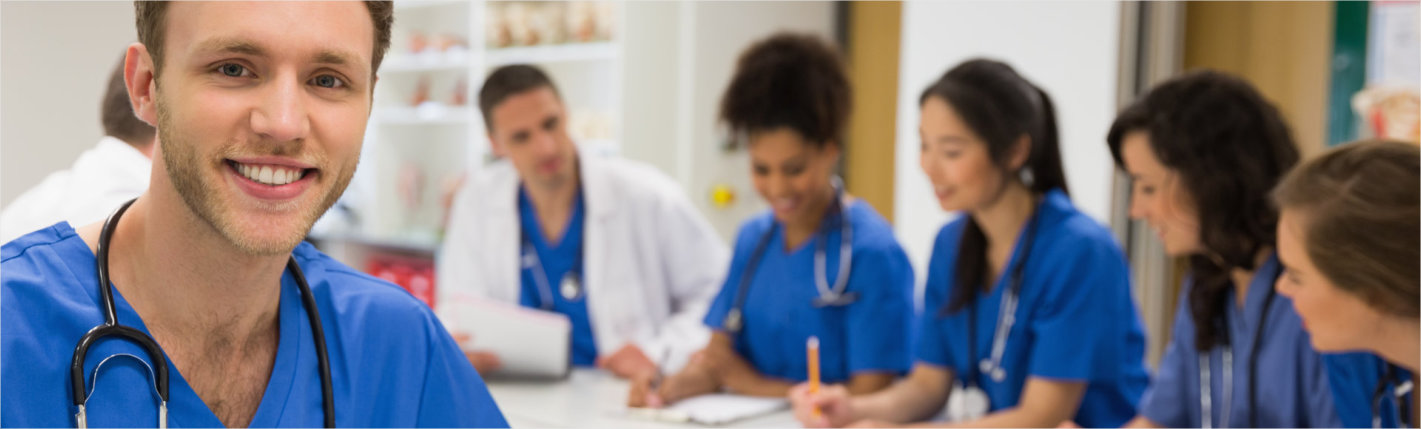 pharmacist smiling at customer at the counter